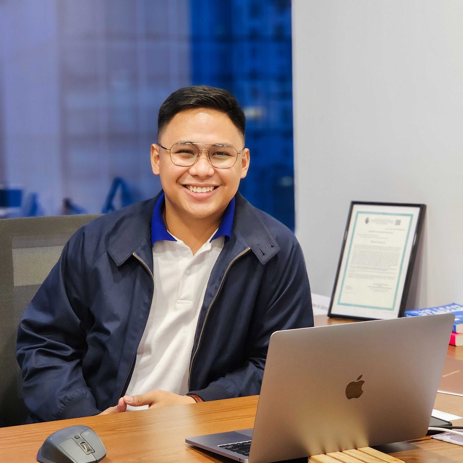 Clarry Herrera at his desk